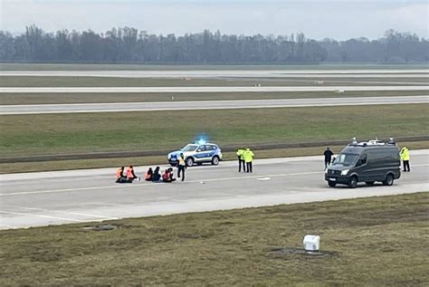 Climate activists block runways at 2 German airports, causing numerous flight cancelations